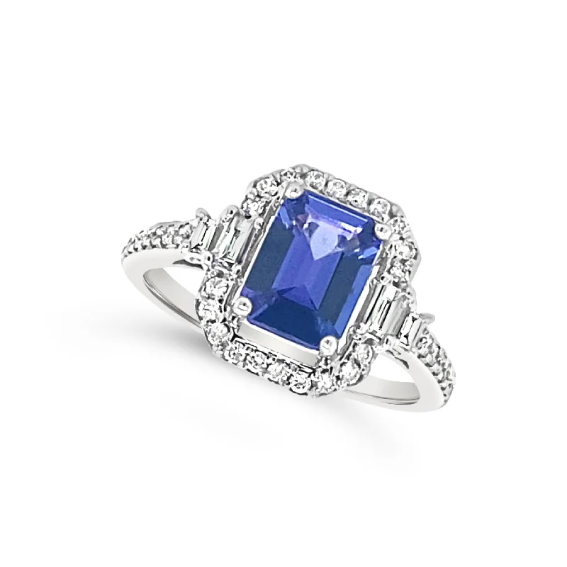 Discounted Luxury Jewelry – Shine Without The Splurge Emerald Shaped Tanzanite and Diamond Halo Ring Discounted Luxury Jewelry – Shine Without The Splurge Emerald Shaped Tanzanite and Diamond Halo Ring