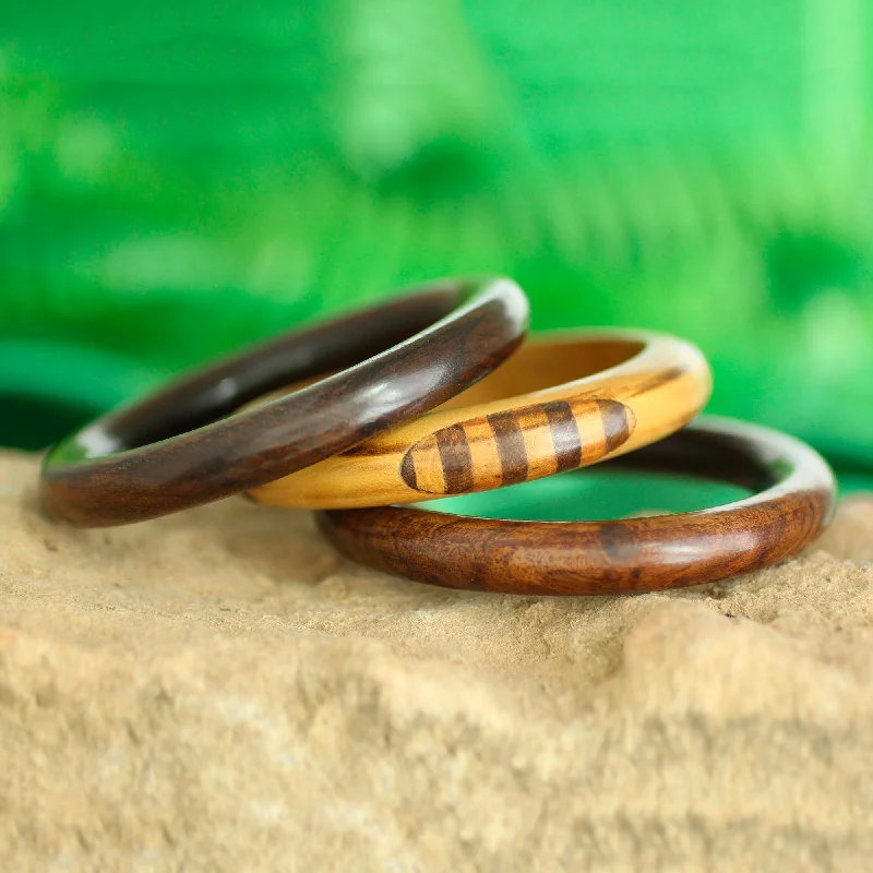 Timeless Jewelry At Special Discount Rates Chic Combination Handmade Mango Wood Bangle Bracelets from India (Set of 3) Timeless Jewelry At Special Discount Rates Chic Combination Handmade Mango Wood Bangle Bracelets from India (Set of 3)