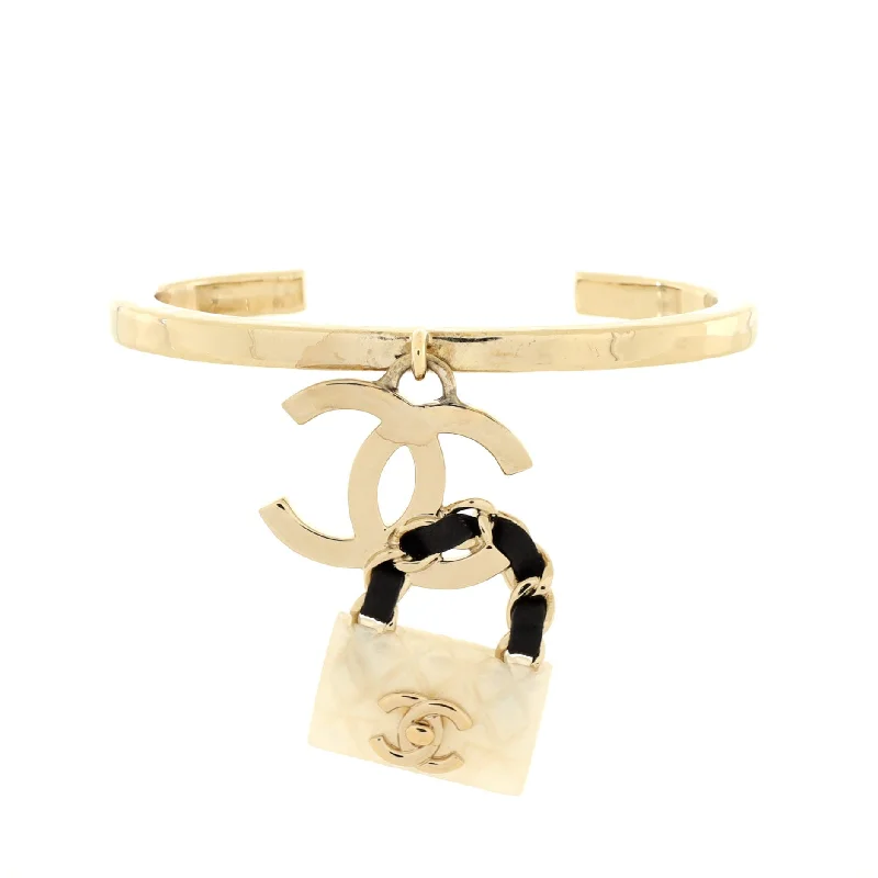 Stunning Statement Jewelry, Unbeatable Discounts Dangle CC Flap Bag Cuff Bracelet Metal with Resin and Leather Stunning Statement Jewelry, Unbeatable Discounts Dangle CC Flap Bag Cuff Bracelet Metal with Resin and Leather