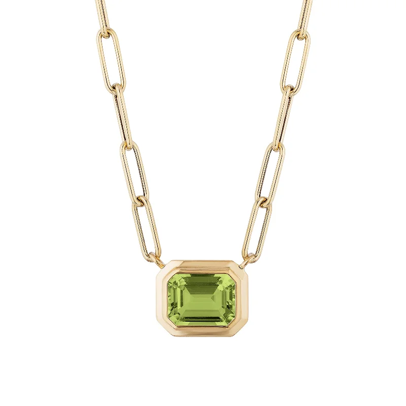 Shop High-Quality Jewelry At Jaw-Dropping Discounts Peridot Emerald Cut East West Pendant Shop High-Quality Jewelry At Jaw-Dropping Discounts Peridot Emerald Cut East West Pendant