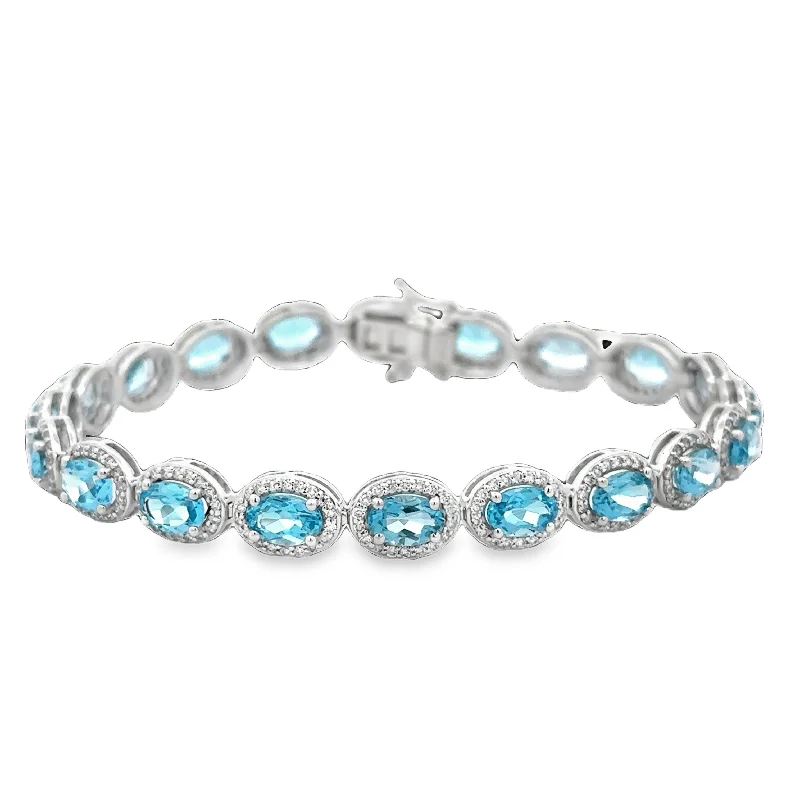 Adjustable Charm Bracelets For A Perfect Fit Blue Topaz and Diamond Bracelet in White Gold Adjustable Charm Bracelets For A Perfect Fit Blue Topaz and Diamond Bracelet in White Gold