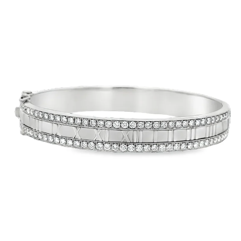 Trending Jewelry Now Available At Exclusive Prices Vintage 1990s Tiffany & Co. Atlas Diamond Bangle Bracelet in 18k White Gold Trending Jewelry Now Available At Exclusive Prices Vintage 1990s Tiffany & Co. Atlas Diamond Bangle Bracelet in 18k White Gold
